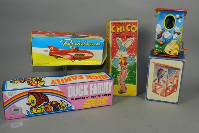 Four 1950's Japan Tin Litho Toys in Box: Four 1950's Japan Tin Litho Toys in Boxes. Duck family, Chico the bunny, rocket racer All like new old stock as shown.