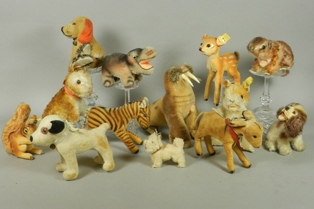 Collection of 13 Early Steiff Animals: Including Walrus, rabbits, squirrel, beaver, several dogs, baby hippo and others. Many with tags and pins as shown. 3 Maybe just very early German animal. All in good-excellent condition.