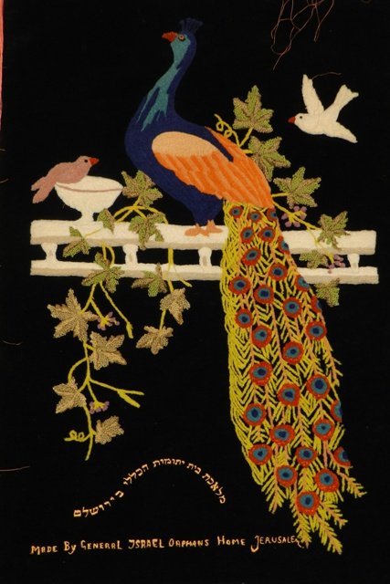 Jewish Needlepoint Wall Hanging in Hebrew: Jewish needlepoint wall hanging in Hebrew, made by the General Israel Orphans Home Jerusalem ca. 1920's, excellent color and needlepoint on velvet. Approx. H 36" x W 25". In very good condition, only