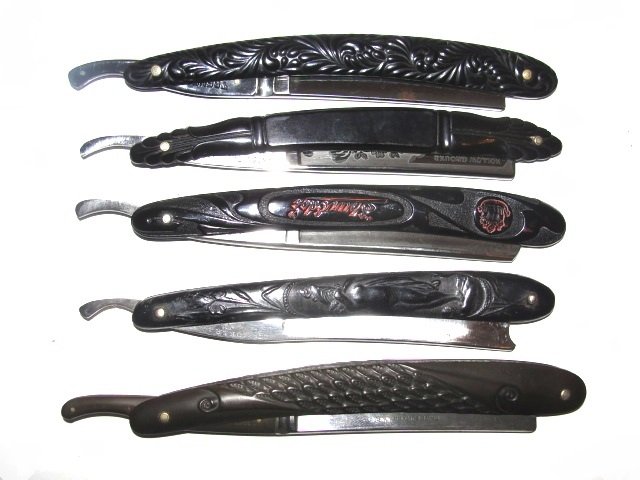 Collection Of Vintage Celluloid Straight Razors: Antoni Tadross. # 2581 Blade etched with Hollow Ground Antoni Tadross & Co. and etched floral design. H. Boker & Co. Germany black celluloid with nude lady standing on mans back. Robeson Shuredge Roch