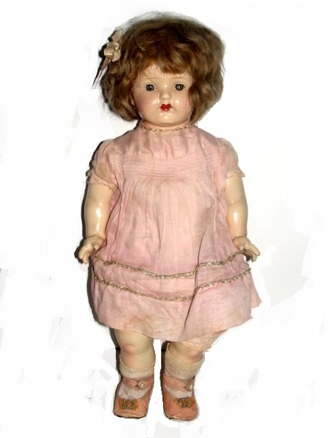Effanbee 1920-30's Lg. Vintage Composition Doll: Unmarked large composition head, arms and lower legs and cloth jointed body doll with sleepy eye's, open mouth with two teeth and tongue, in original clothing. Condition good overall with open crack o