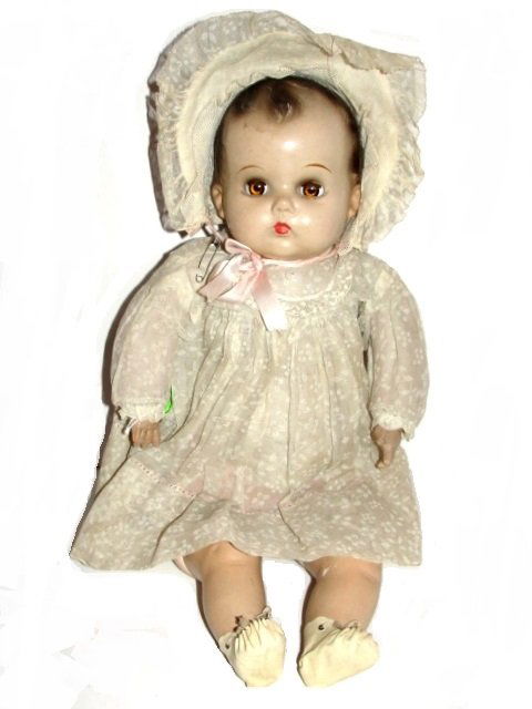Effanbee Composition & Cloth Doll Ca.1930's: Effanbee unmarked composition & cloth doll, jointed body, molded hair and sleep eye's with non working squeaky box in original outfit. Condition overall very good. 21'' Tall. ''NO STANDS GO WITH DOLL'
