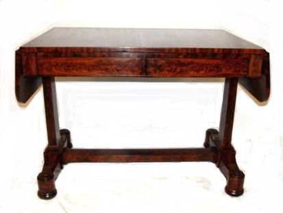 Important Duncan Phyfe Sofa Table Ca. 1835: Important Duncan Phyfe sofa table Ca. 1825-1835 in mahogany resting on a bracketed trestle base with turned feet inset with A. Thorpe casters. ( Paper Label In Drawer Reads, This Table Was Owned By Dr