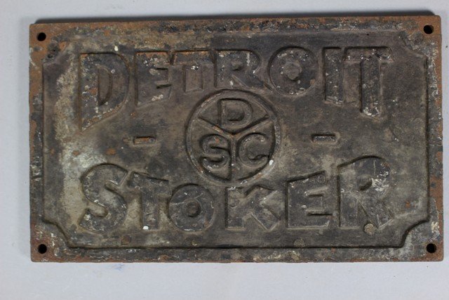 ca 1900 Detroit Stoker Co. Builder's Plate: ca 1900 cast iron Detroit Stoker Co., MI, builder's plate. Impressed number on verso appear to read "5577A." h 7" X w 11.75". Fair condition, rust throughout.
