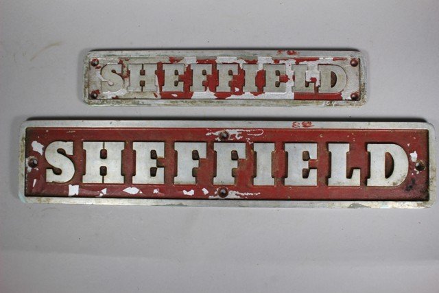 Pair of Vintage Sheffield Motors Inc. Builder's Plates: Two matching Sheffield Motors, WI, aluminum builder's plates with original red enamel decoration. Smaller, H 3" x W 15", larger H 4.5" x W 22". Overall fair condition, paint loss throughout and contin
