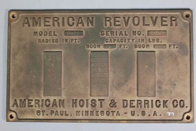 American Hoist & Derrick Co. Builder's Plate: American Hoist & Derrick Co., MN, "American Revolver" builder's plate, cast iron with bronze patina. Model R-15, Serial No. 861. H 9" x W 14.5". Overall good condition.