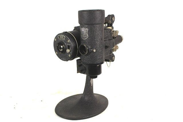 Vintage Bell & Howell 8mm Film Projector: ca 1930's Bell & Howell 8mm film projector with original case. Case H 11" x W 12" x D 9". Overall good condition.