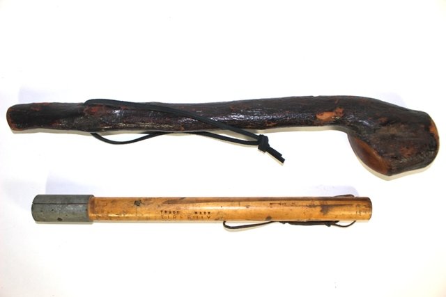 Tire Billy and Natural Wood Clubs: Tire Billy, trademark, billy club for protection, L 16". Natural wood club, cut and sanded in some areas, L 21", some bark starting to deteriorate.