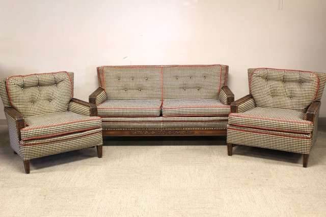 Romweber Three Piece Carved Viking Oak Parlor Suite: Romweber carved Viking oak parlor suite, hounds tooth pattern upholstery, two chairs and settee. Lounge chairs H. 31" W. 35" D. 36". Sofa H. 31" W. 62" D. 35". Overall good condition, cushions are som
