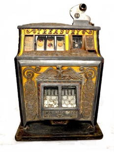 Watling Treasury Twin Slot Machine Ca. 1930's: Watling Twin Jackpot Gooseneck Bell, slot machine. In working order. Having oak sides, nickel plated and enameled face, with original works. Enamel yellow paint and black painted wood base. There are