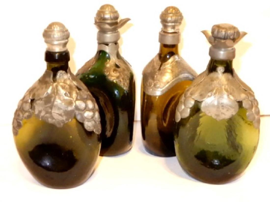 Four Denmark Pewter Overlay Pinched Decanters (1 of 7)