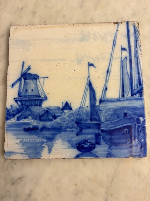 Antique C Blue & White Delt Dutch Tile, Traditional Scene of Sailboats, Windmills, and Wide Open Sky: This is an antique or vintage Delftware blue and white ceramic tile, featuring a classic Dutch scene with a windmill and sailing boats. Design: The tiles typically feature scenes of sailing boats, win