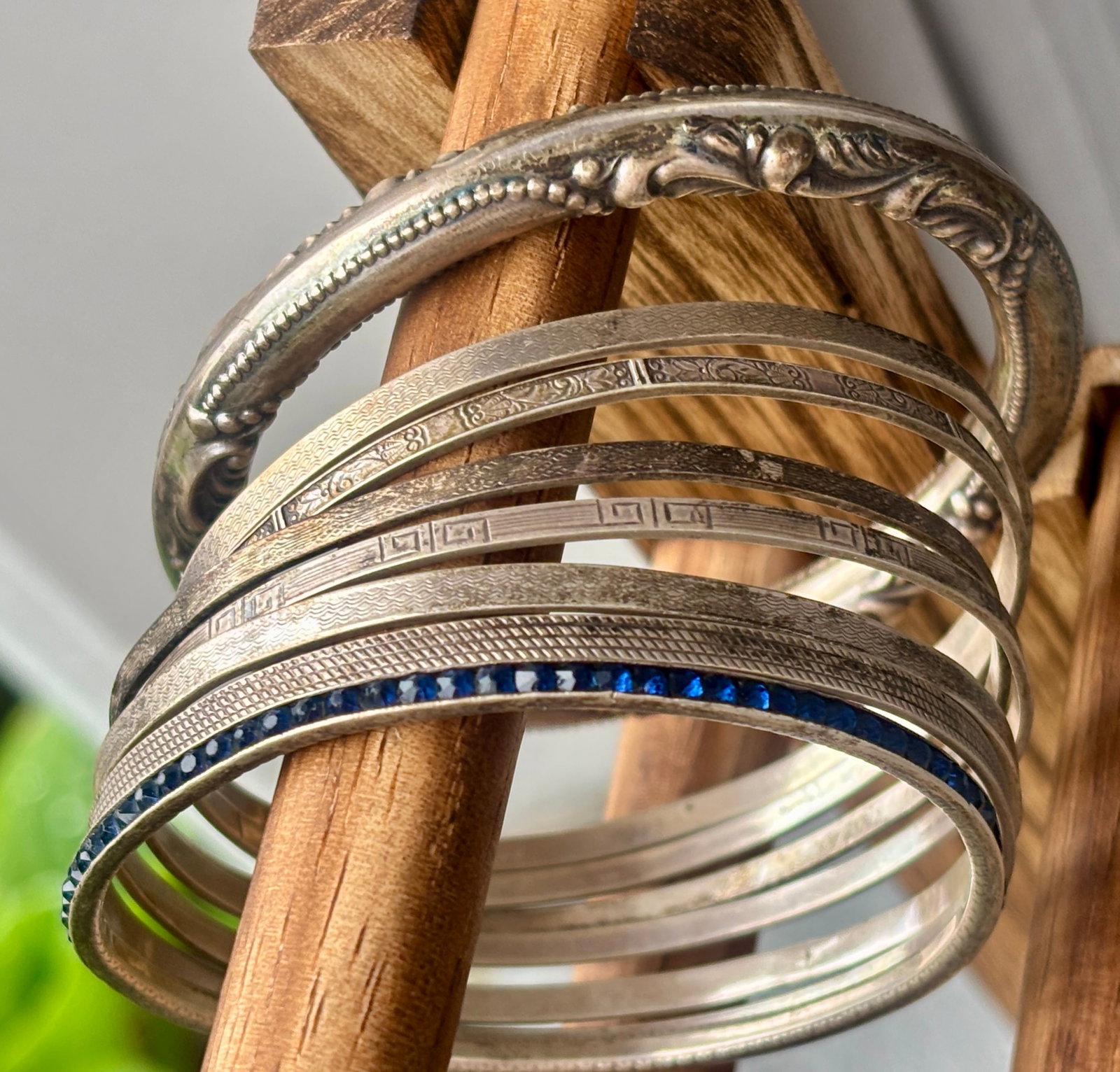 Lot of 8 Vintage Sterling Bangle Bracelets - various designs, 55.6g: Lot of 8 Sterling Bangle Bracelets - various designs, 55.6gRange from good to excellent pre-owned condition. Some patterns have worn in some areas. Total weight is 55.6g.These bracelets will fit a sma