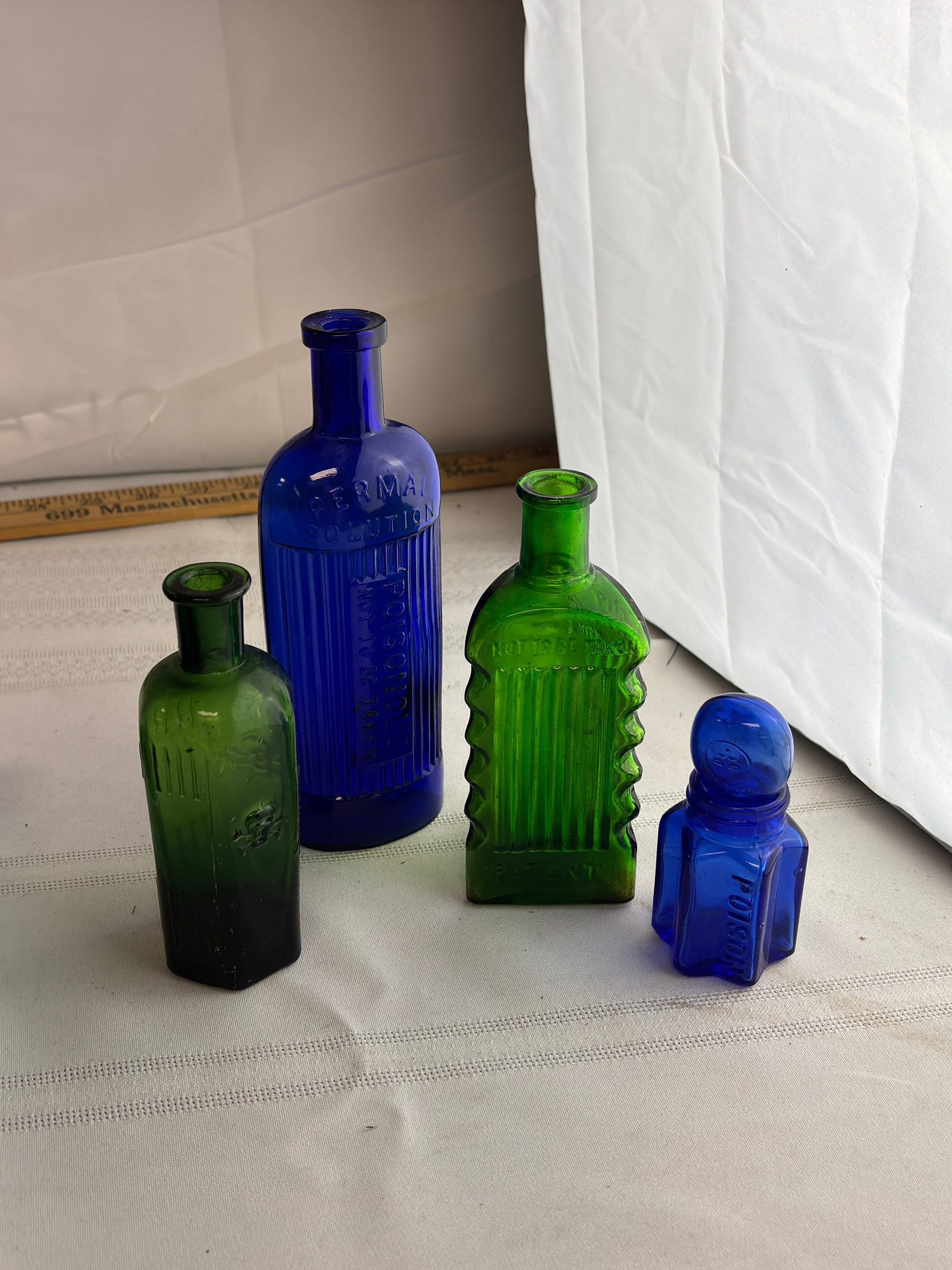 Assorted Poison Bottles (group A): This is for a set of poison bottles. No chips or cracks noted.