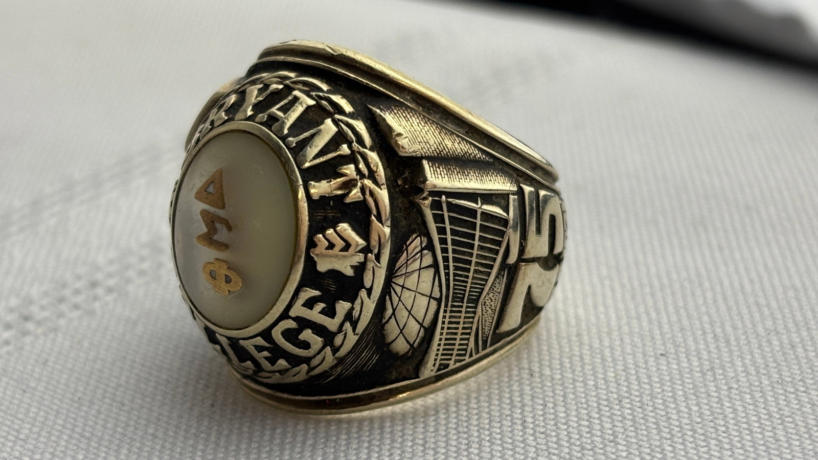 Bryant University Men's Mens 10K Yellow Gold College Ring, 34 grams: In excellent condition. Mens chunky 10k Yellow gold college ring. Has fraternal letters on front, name inside.