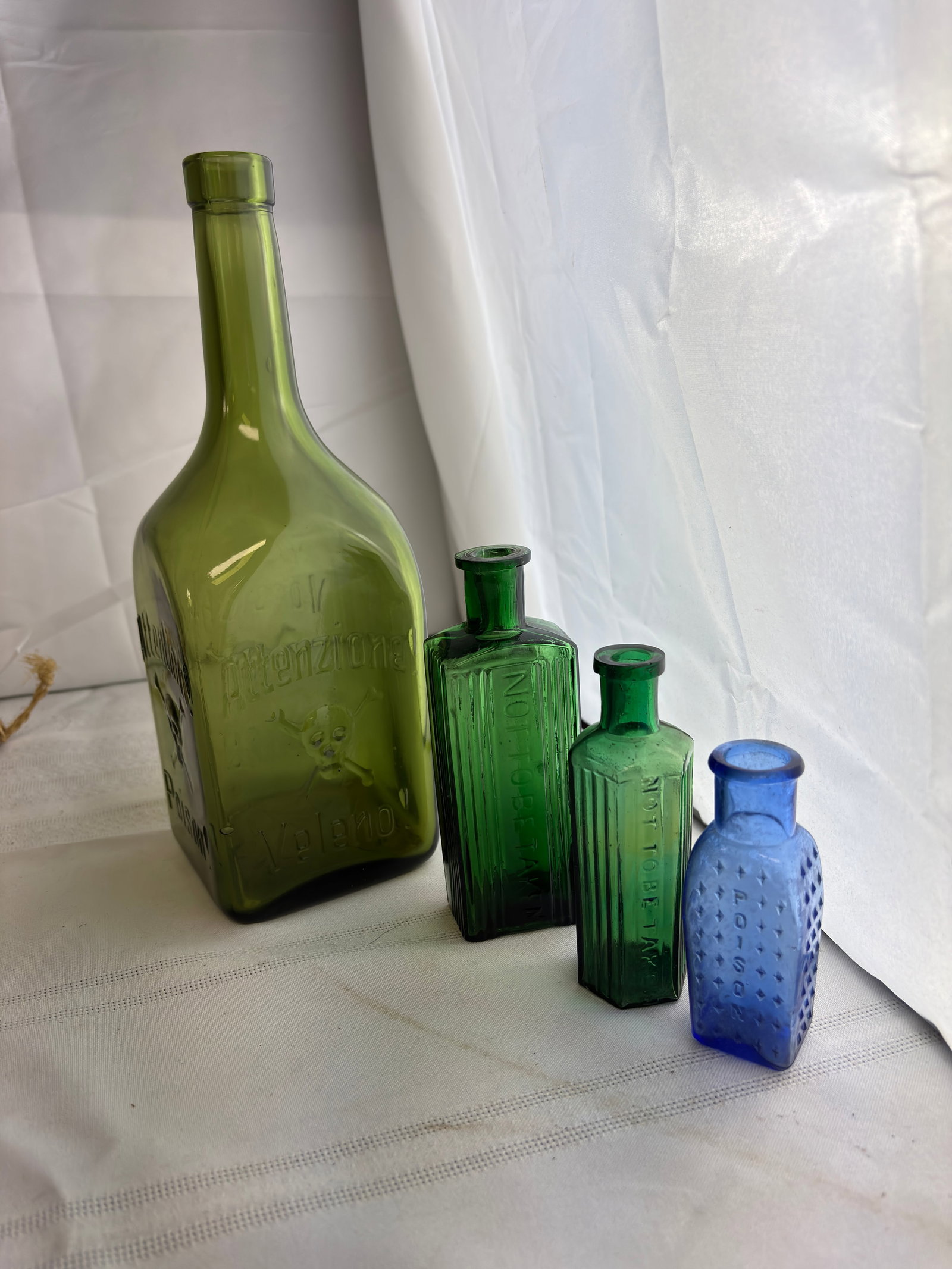 Lot of 4 Poison Bottles (Group D): Lot of 4 Poison Bottles (Group D) In excellent preowned condition - no chips or cracks.