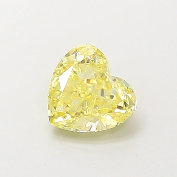 0.66 Lab Grown Diamond FANCY INTENSE YELLOW HEART Shape: Offered here is a 0.66 ct lab-grown diamond in Fancy Intense Yellow, cut with a balanced heart shape with sweet appeal. Ready to set in a halo setting, this stone delivers rich color depth with strong