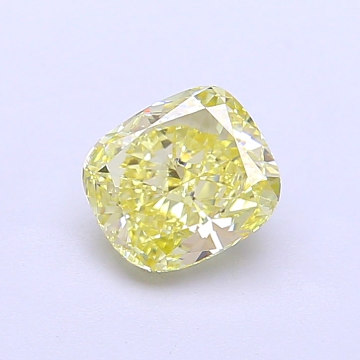 1.12 Lab Grown Diamond FANCY YELLOW CUSHION Shape: Featuring a 1.12 ct lab-grown diamond in Fancy Yellow, cut with a romantic cushion outline. A great choice for a minimalist setting, this stone delivers a pleasing color presence with bright life and