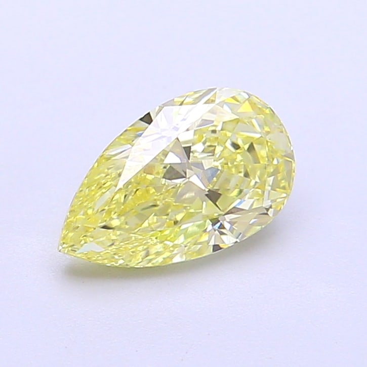 1.15 Lab Grown Diamond FANCY YELLOW PEAR Shape: Offered here is a 1.15 ct lab-grown diamond in Fancy Yellow, cut with a classic pear outline with a tapered tip. Ready to set in a halo setting, this stone delivers a pleasing color presence with brig