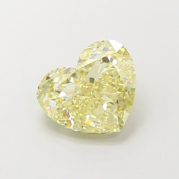 1.45 Lab Grown Diamond FANCY LIGHT YELLOW HEART Shape: Featuring a 1.45 ct lab-grown diamond in Fancy Light Yellow, cut with a balanced heart shape with sweet appeal. A great choice for a minimalist setting, this stone delivers a soft, luminous tone with
