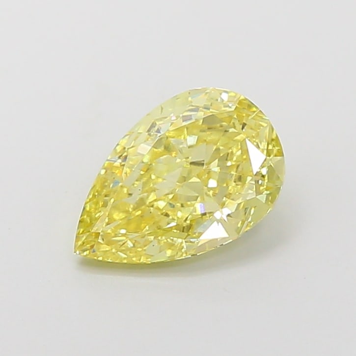 1.5 Lab Grown Diamond FANCY VIVID YELLOW PEAR Shape: A beautifully crafted a 1.50 ct lab-grown diamond in Fancy Vivid Yellow, cut with a classic pear outline with a tapered tip. Designed for a vintage-inspired design, this stone delivers high-saturation