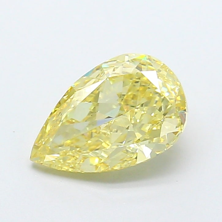 1.57 Lab Grown Diamond FANCY YELLOW PEAR Shape: A captivating a 1.57 ct lab-grown diamond in Fancy Yellow, cut with a classic pear outline with a tapered tip. An excellent pick for a pendant, this stone delivers a pleasing color presence with brigh