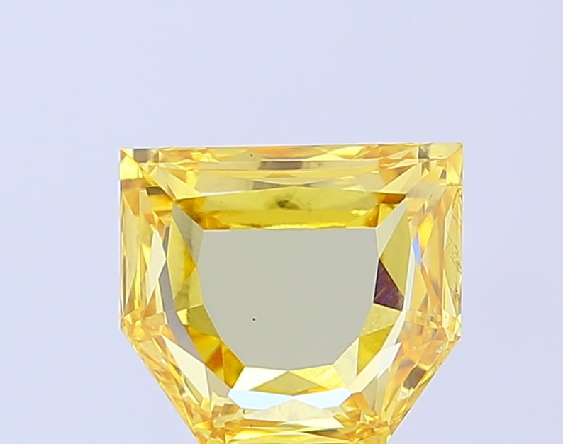 2.39 Lab Grown Diamond FANCY VIVID YELLOW OTHER Shape: An elegant a 2.39 ct lab-grown diamond in Fancy Vivid Yellow, cut with a distinctive custom outline. Crafted to elevate a three-stone ring, this stone delivers high-saturation color that stands out be