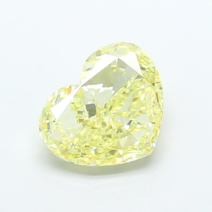 2.61 Lab Grown Diamond FANCY LIGHT YELLOW HEART Shape: Presenting a 2.61 ct lab-grown diamond in Fancy Light Yellow, cut with a romantic heart silhouette. Pairs beautifully with a earring drops, this stone delivers a soft, luminous tone with a refined glo