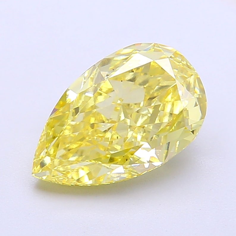 2.67 Lab Grown Diamond FANCY VIVID YELLOW PEAR Shape: A beautifully crafted a 2.67 ct lab-grown diamond in Fancy Vivid Yellow, cut with a graceful teardrop profile. Designed for a vintage-inspired design, this stone delivers high-saturation color that st