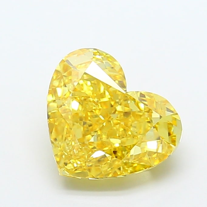 5.22 Lab Grown Diamond FANCY VIVID YELLOW HEART Shape: A beautifully crafted a 5.22 ct lab-grown diamond in Fancy Vivid Yellow, cut with a romantic heart silhouette. Designed for a vintage-inspired design, this stone delivers high-saturation color that st