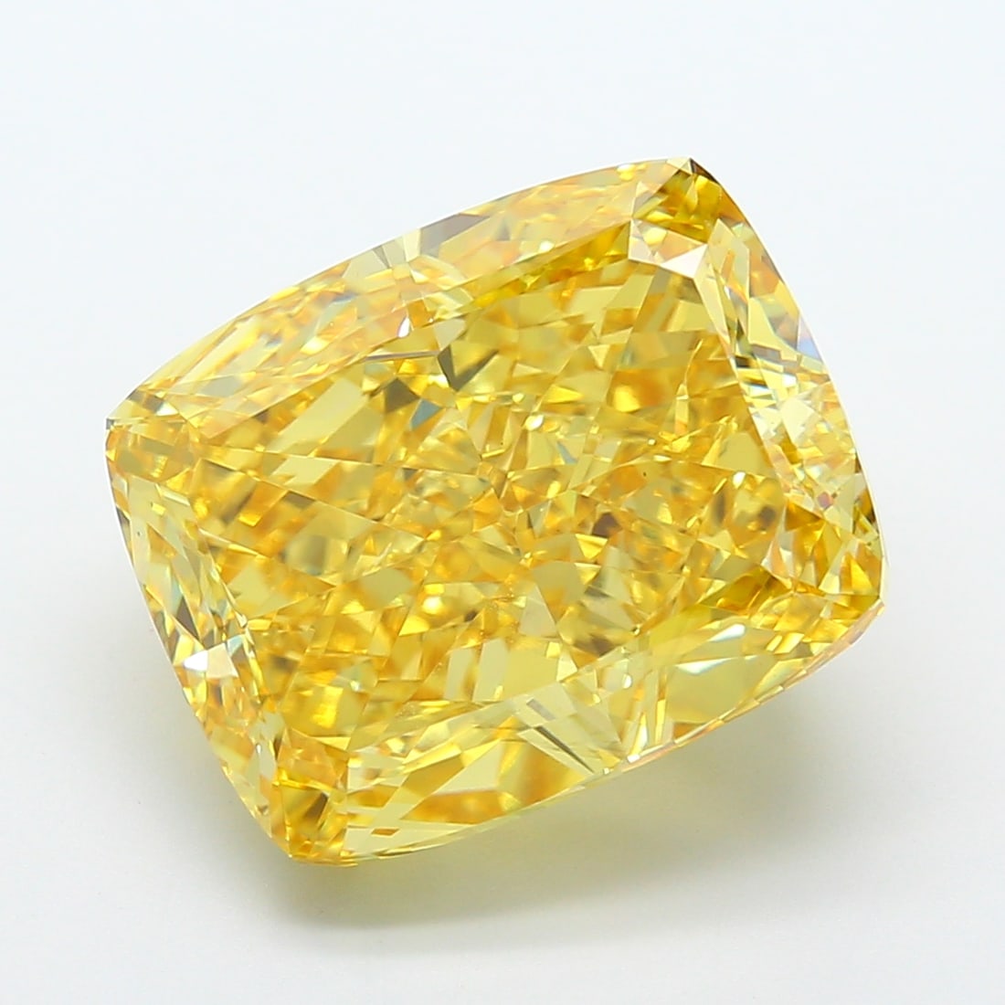 18.03 Lab Grown Diamond FANCY VIVID YELLOW CUSHION Shape: A standout a 18.03 ct lab-grown diamond in Fancy Vivid Yellow, cut with a romantic cushion outline. Made to shine in a side-stone layout, this stone delivers high-saturation color that stands out beau