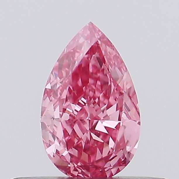 0.32 Lab Grown Diamond FANCY VIVID PINK PEAR Shape: Featuring a 0.32 ct lab-grown diamond in Fancy Vivid Pink, cut with a classic pear outline with a tapered tip. A great choice for a minimalist setting, this stone delivers high-saturation color that s