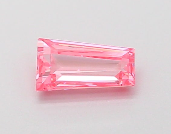 0.32 Lab Grown Diamond FANCY VIVID PINK BAGUETTE Shape: Presenting a 0.32 ct lab-grown diamond in Fancy Vivid Pink, cut with a crisp baguette silhouette. Pairs beautifully with a earring drops, this stone delivers high-saturation color that stands out beau