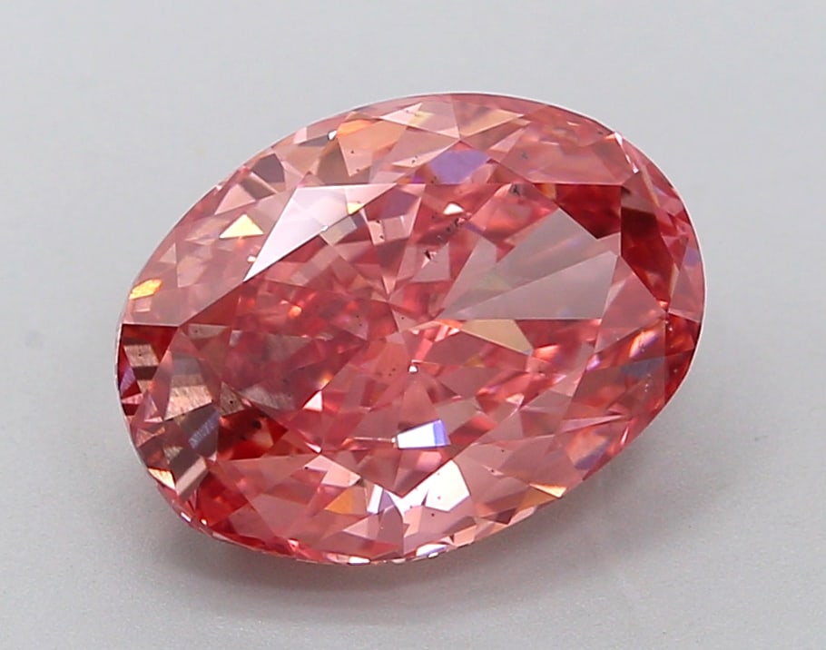 3.52 Lab Grown Diamond FANCY VIVID PINK OVAL Shape: A beautifully crafted a 3.52 ct lab-grown diamond in Fancy Vivid Pink, cut with a timeless oval outline. Designed for a vintage-inspired design, this stone delivers high-saturation color that stands o