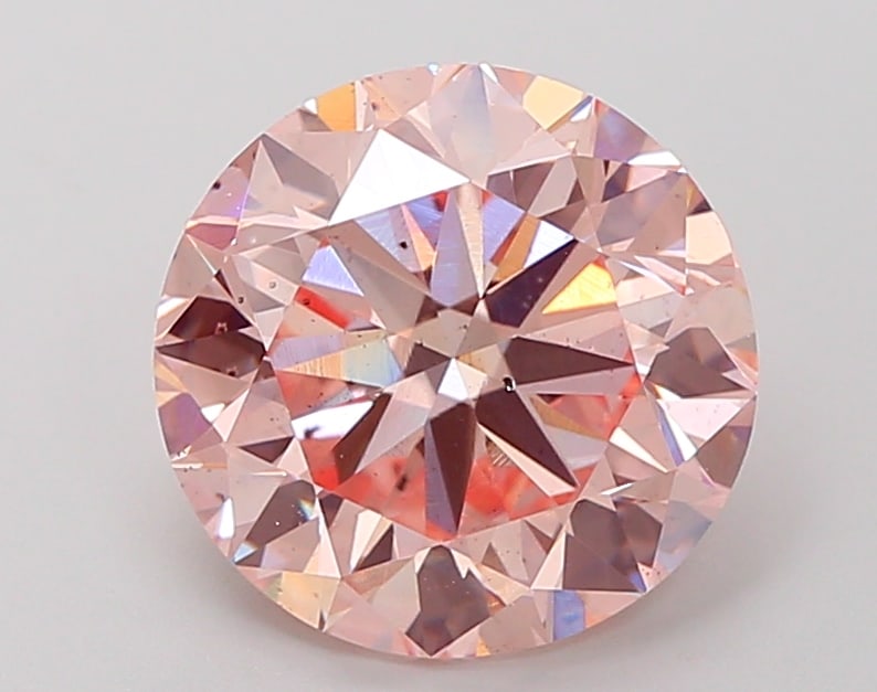 4.09 Lab Grown Diamond FANCY INTENSE PINK ROUND Shape: A striking a 4.09 ct lab-grown diamond in Fancy Intense Pink, cut with a traditional round profile. Perfect for a modern bespoke piece, this stone delivers rich color depth with strong visual presence