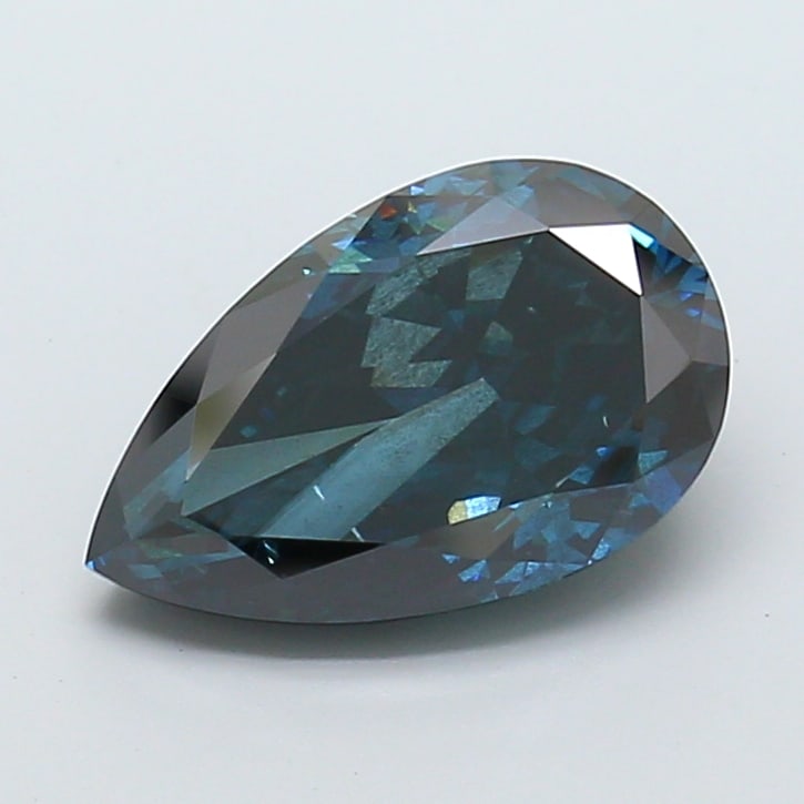 5.48 Lab Grown Diamond FANCY DEEP BLUE PEAR Shape: Offered here is a 5.48 ct lab-grown diamond in Fancy Deep Blue, cut with an elongated teardrop silhouette. Ready to set in a halo setting, this stone delivers a deeper tone with dramatic, luxurious im