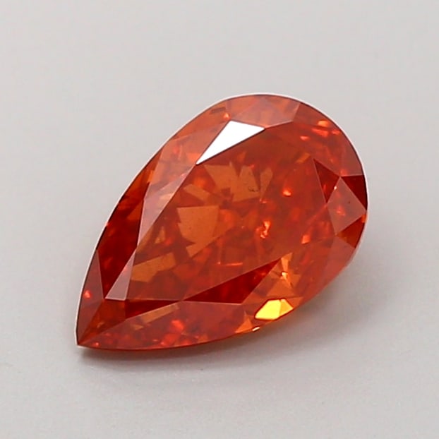 1.11 Lab Grown Diamond FANCY VIVID RED PEAR Shape: Featuring a 1.11 ct lab-grown diamond in Fancy Vivid Red, cut with a classic pear outline with a tapered tip. A great choice for a minimalist setting, this stone delivers high-saturation color that st