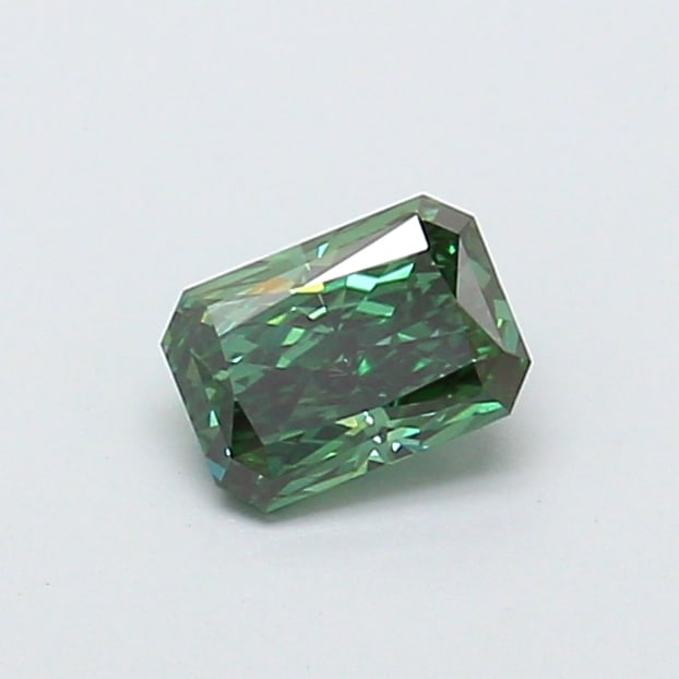 0.52 Lab Grown Diamond FANCY VIVID GREEN RADIANT Shape: Presenting a 0.52 ct lab-grown diamond in Fancy Vivid Green, cut with crisp facets with vivid sparkle. Pairs beautifully with a earring drops, this stone delivers high-saturation color that stands out