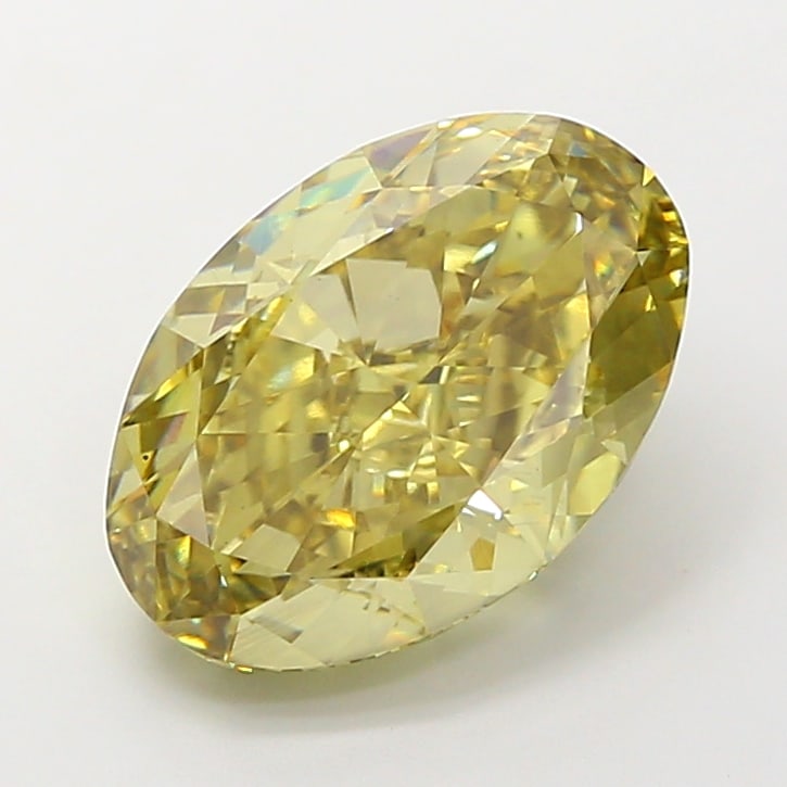 6.41 Lab Grown Diamond FANCY OLIVE GREEN OVAL Shape: A beautifully crafted a 6.41 ct lab-grown diamond in Fancy Olive Green, cut with an elongated oval silhouette. Designed for a vintage-inspired design, this stone delivers a pleasing color presence wit