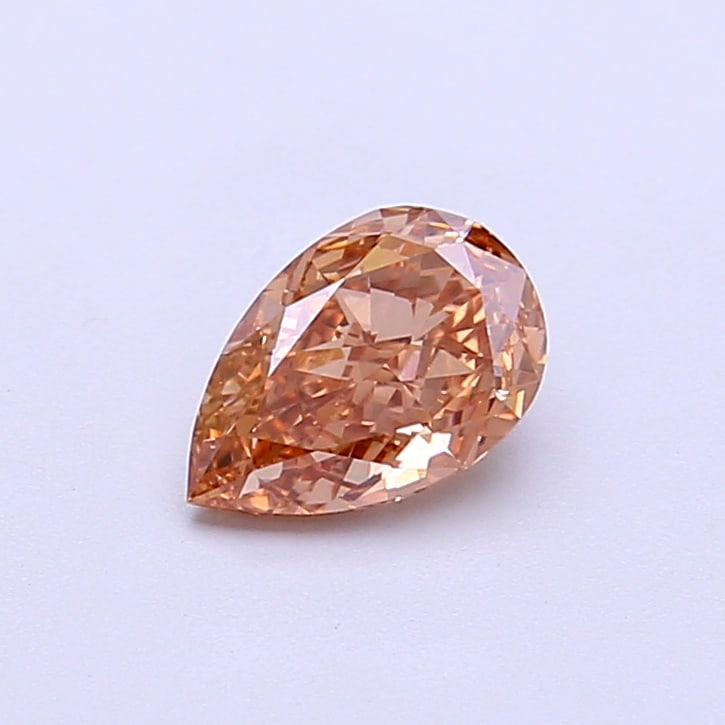 0.71 Lab Grown Diamond FANCY BROWN PEAR Shape: Featuring a 0.71 ct lab-grown diamond in Fancy Brown, cut with a graceful teardrop profile. A great choice for a minimalist setting, this stone delivers a pleasing color presence with bright life and