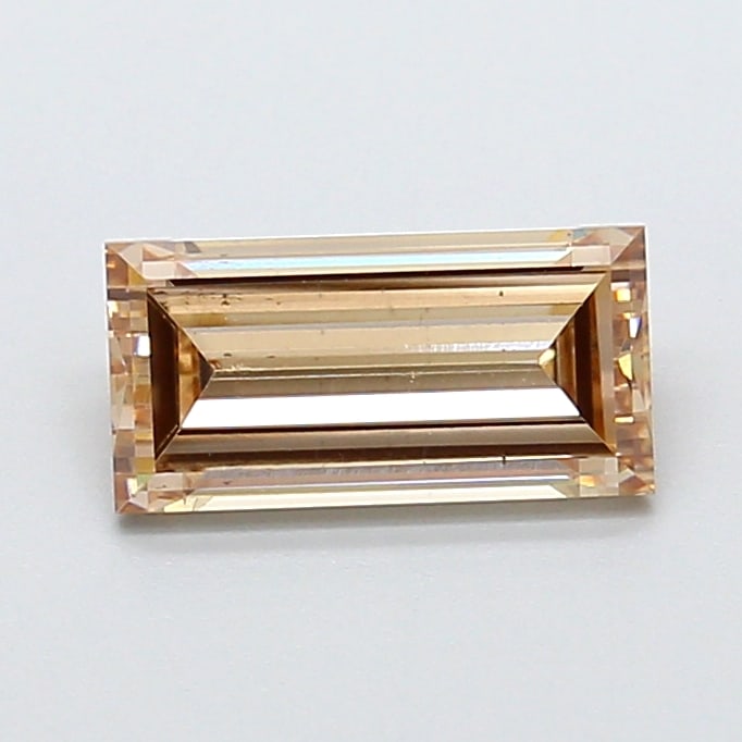 1.2 Lab Grown Diamond FANCY LIGHT BROWN BAGUETTE Shape: A standout a 1.20 ct lab-grown diamond in Fancy Light Brown, cut with clean lines and a sleek look. Made to shine in a side-stone layout, this stone delivers a soft, luminous tone with a refined glow