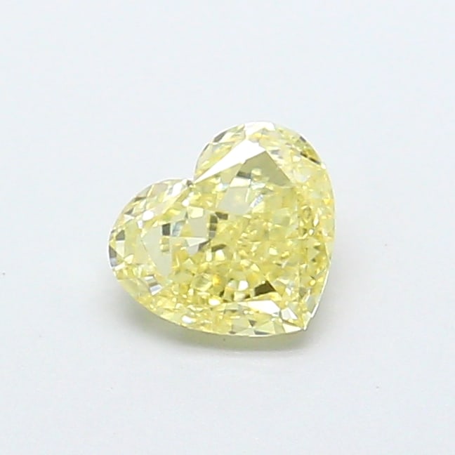 Fancy Lab Grown Diamond HEART Shape 0.58 cts VS1 Grade FANCY LIGHT YELLOW Color: Fancy Lab Grown Diamond HEART Shape 0.58 cts VS1 Grade FANCY LIGHT YELLOW Color. Natural fancy colour lab-grown diamond, certified. Ideal for bespoke fine jewelry, engagement rings, and collectors of 