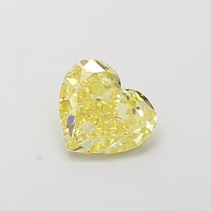 Fancy Lab Grown Diamond HEART Shape 0.61 cts SI1 Grade FANCY VIVID YELLOW Color: Fancy Lab Grown Diamond HEART Shape 0.61 cts SI1 Grade FANCY VIVID YELLOW Color. Natural fancy colour lab-grown diamond, certified. Ideal for bespoke fine jewelry, engagement rings, and collectors of 