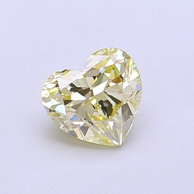 Fancy Lab Grown Diamond HEART Shape 0.69 cts VVS2 Grade FANCY YELLOW Color: Fancy Lab Grown Diamond HEART Shape 0.69 cts VVS2 Grade FANCY YELLOW Color. Natural fancy colour lab-grown diamond, certified. Ideal for bespoke fine jewelry, engagement rings, and collectors of rare 