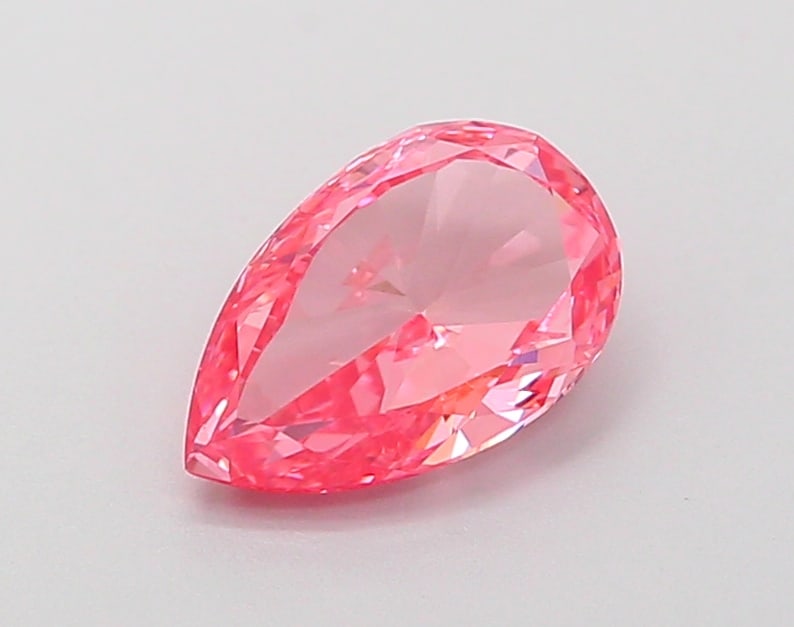 Fancy Lab Grown Diamond PEAR Shape 0.89 cts VVS2 Grade FANCY VIVID PINK Color: Fancy Lab Grown Diamond PEAR Shape 0.89 cts VVS2 Grade FANCY VIVID PINK Color. Natural fancy colour lab-grown diamond, certified. Ideal for bespoke fine jewelry, engagement rings, and collectors of ra
