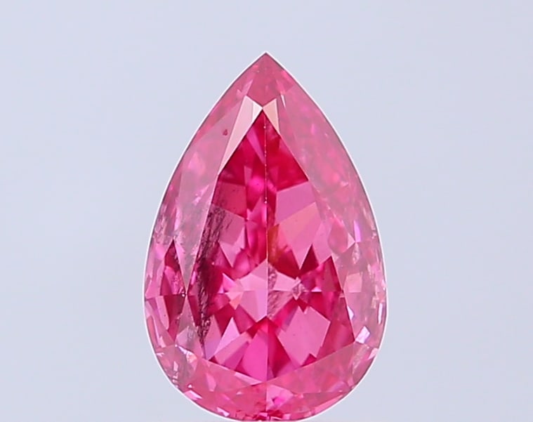 Fancy Lab Grown Diamond PEAR Shape 1.29 cts SI1 Grade FANCY VIVID RED Color: Fancy Lab Grown Diamond PEAR Shape 1.29 cts SI1 Grade FANCY VIVID RED Color. Natural fancy colour lab-grown diamond, certified. Ideal for bespoke fine jewelry, engagement rings, and collectors of rare