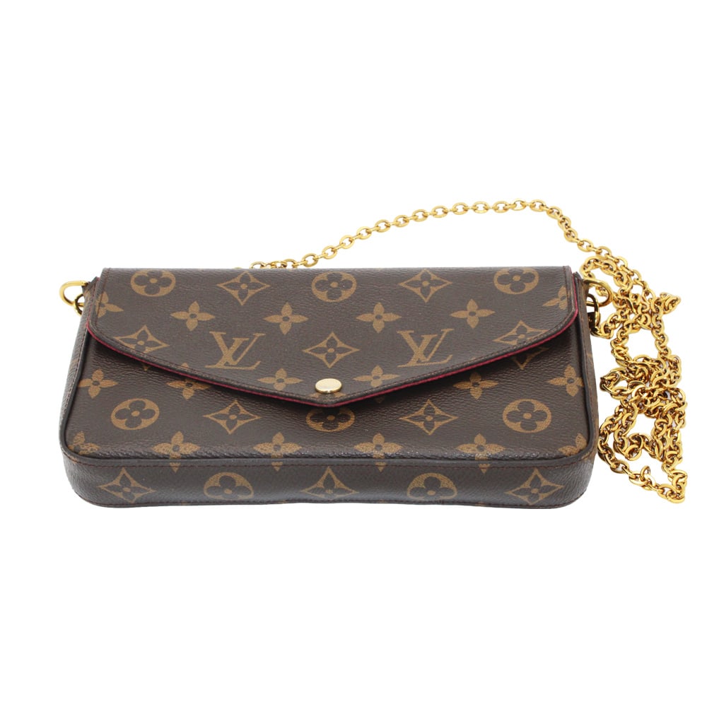 Louis Vuitton Pochette Félicie: This Louis Vuitton Pochette Félicie in classic Monogram canvas features gold-tone chain strap and a sleek envelope flap design. Marked.