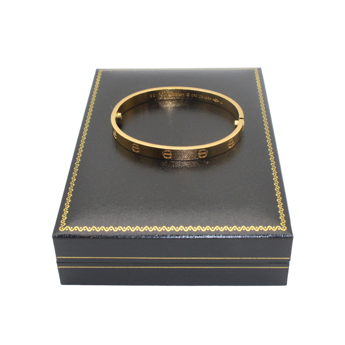 Cartier LOVE-Style Bracelet: Cartier LOVE-style bracelet is marked “750,” “17,” and “Cartier IP 6688 001.” This is a Cartier-style piece.