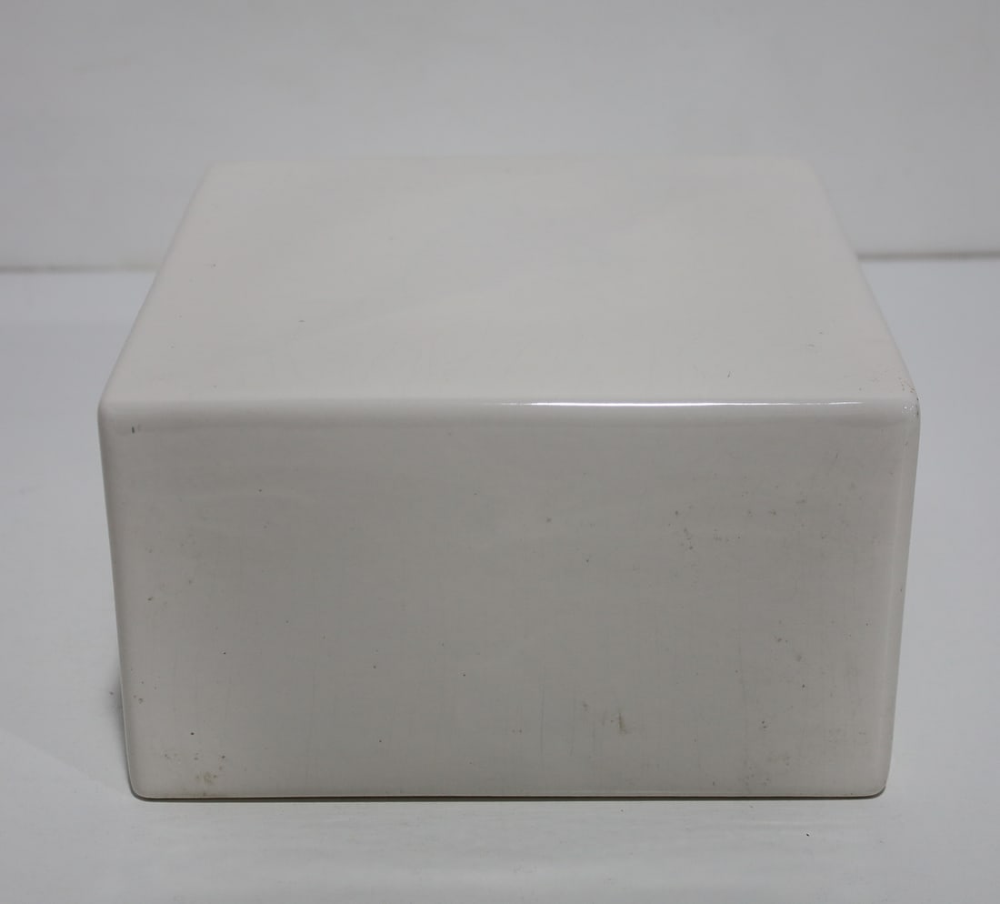 White Ceramic Stand: Great to display collectibles