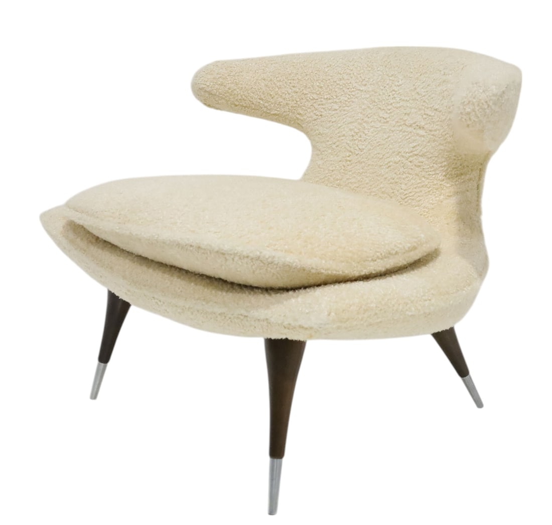 Horn Chair by Karpen of California in Boucle', USA, c. 1960's: The archetypal horn-shaped arms are both visually captivating and wrap the sitter's back with there alluring curves creating a uniquely comfortable sitting experience. Set atop minimalist tapered